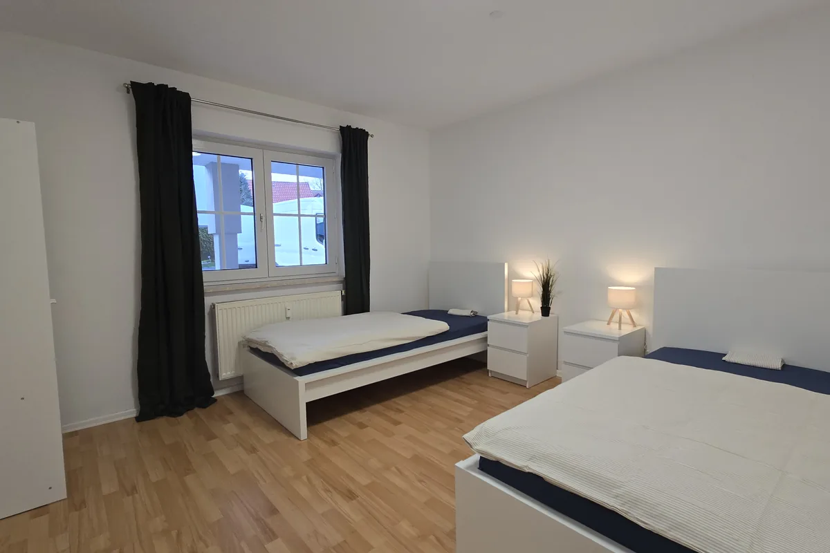 Zimmer mit zwei Einzelbetten
